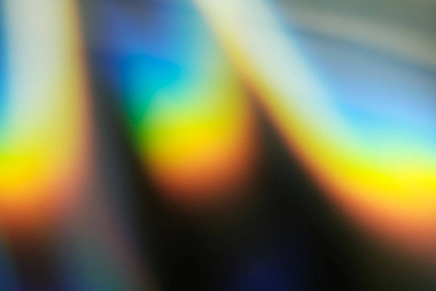 Diffuse color refracted through glass in a calm abstract composition.